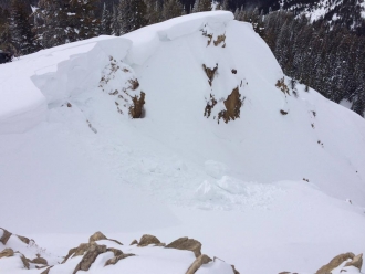 Snowmobile triggered cornice on Black Mountain near Lionhead