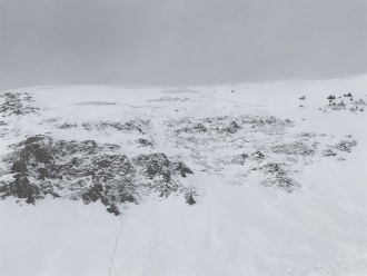 Explosive triggered avalanche on slope with shallow snowpack at Big Sky