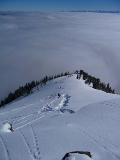 Snowboarder triggering slide on Bridger Peak